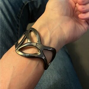 Black gunmetal openwork leaf design hinged clamper bracelet, thick bangle